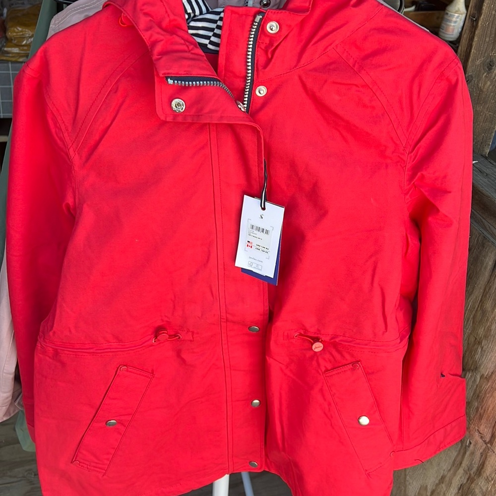 Red Waterproof short trench sizes 10, 4, 2
